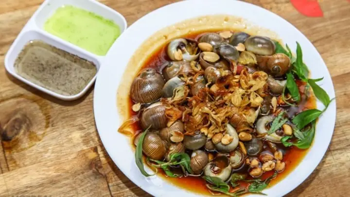 Cách nấu ốc mỡ xào me chua ngọt hấp dẫn tại nhà