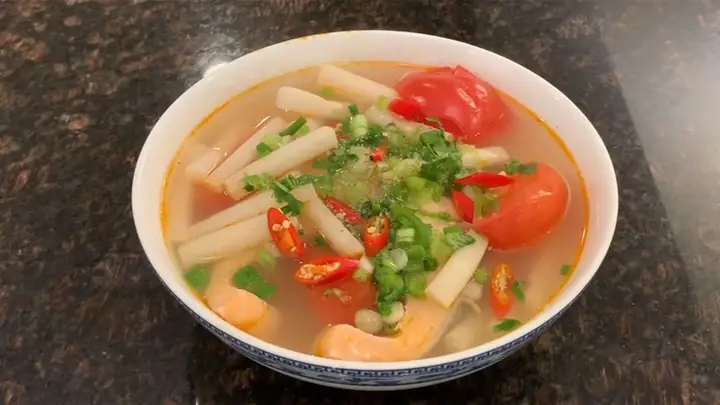 11. Canh Chua Ngó Sen Nấu Cá Hồi