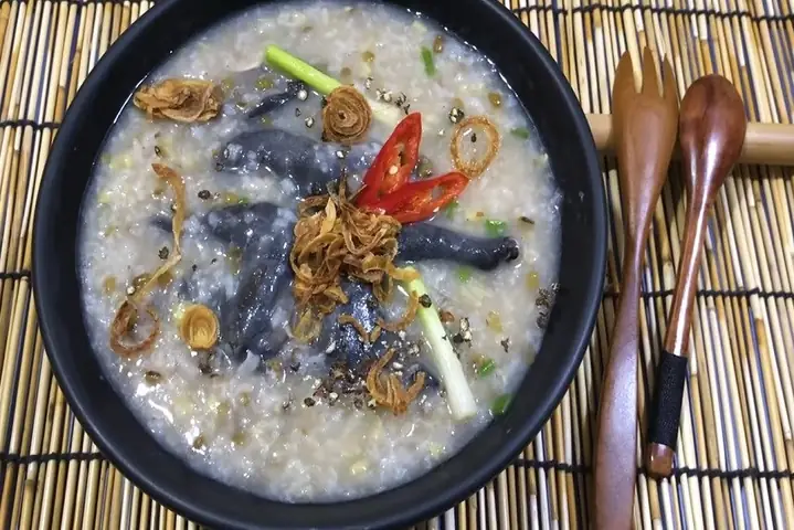 Cháo gà ác nấu đậu đen