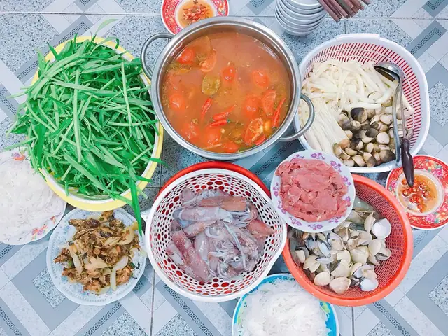 Hoàn Thành Món Lẩu Mực Chua Cay Hoàn Thành Món Lẩu Mực Chua Cay